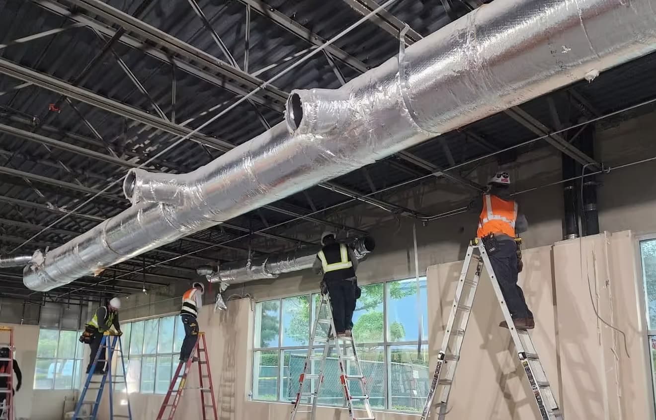 Construction team collaborating on site